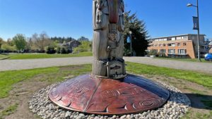 Bronze Disc Base Installed at the base of The Reconciliation Pole